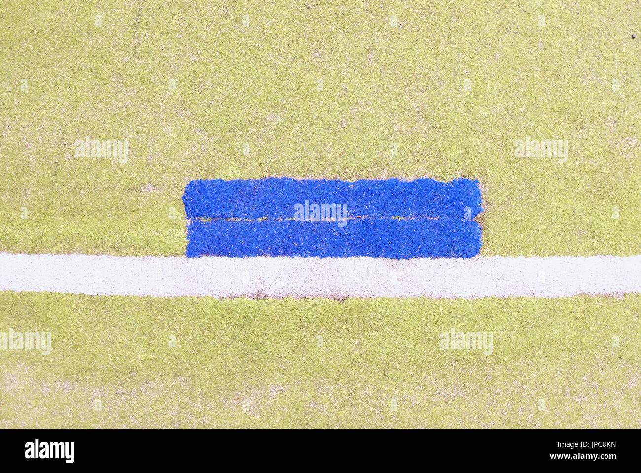 Colorful lines in empty outdoor handball playground, plastic light