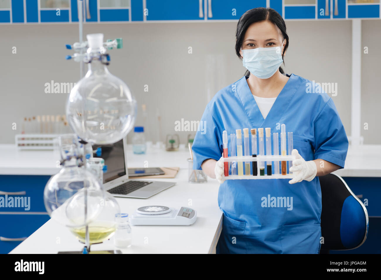 Professional lab worker looking at you Stock Photo