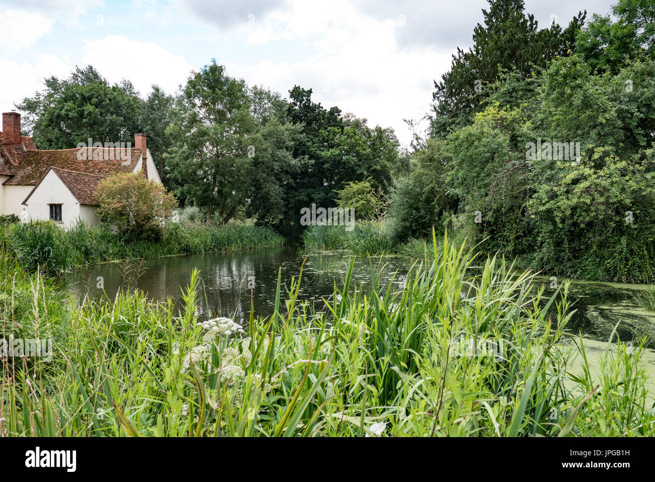 Willy Lott's cottage at Flatford Mill, as seen in the painting The Hay Wain by the artist John Constable. Suffolk, England, United Kingdom. Stock Photo