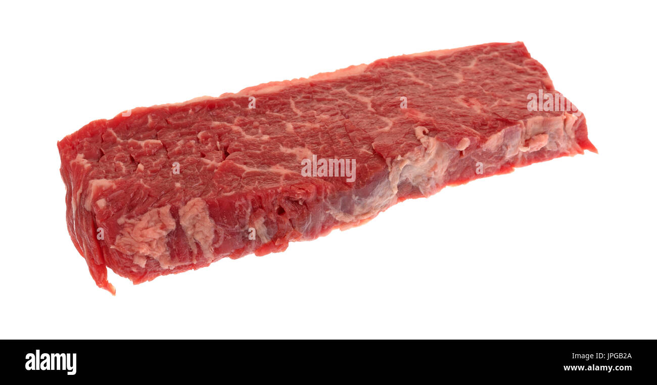 A single raw beef loin sirloin grilling tip isolated on a white