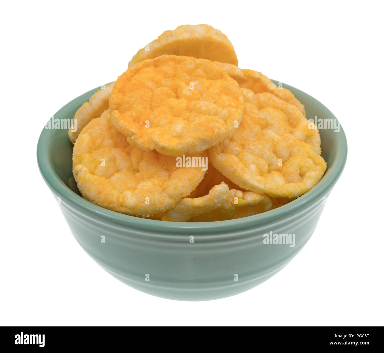 A bowl filled with cheddar cheese rice cakes isolated on a white