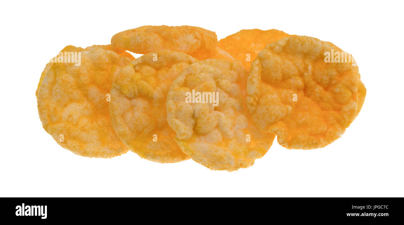 A small group of cheddar cheese rice cakes isolated on a white