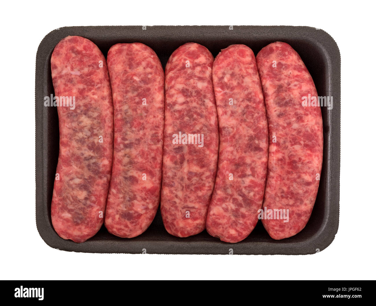 Top view of mild bratwurst sausages in a black foam butchers tray isolated on a white background. Stock Photo