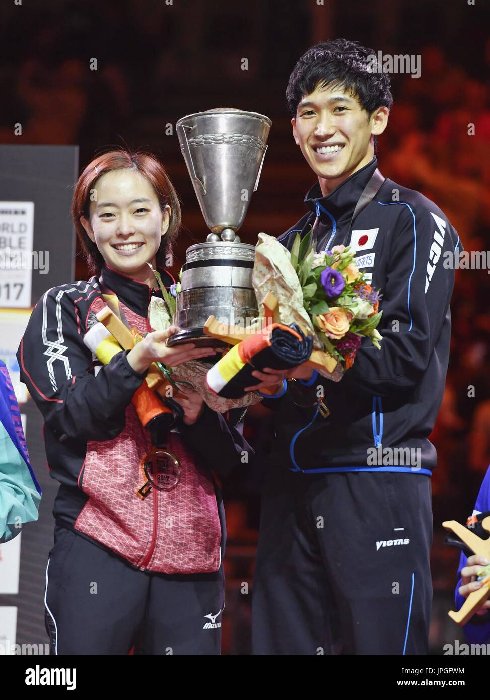 Table tennis mixed doubles champions Kasumi Ishikawa (L) and Maharu
