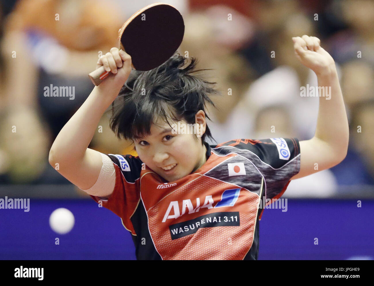 Asian champion Miu Hirano of Japan hits a forehand during her