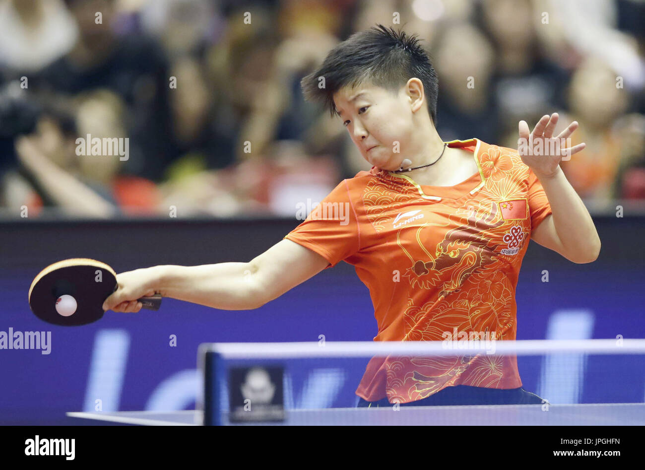 Sun Yingsha hits a forehand en route to winning the women's singles