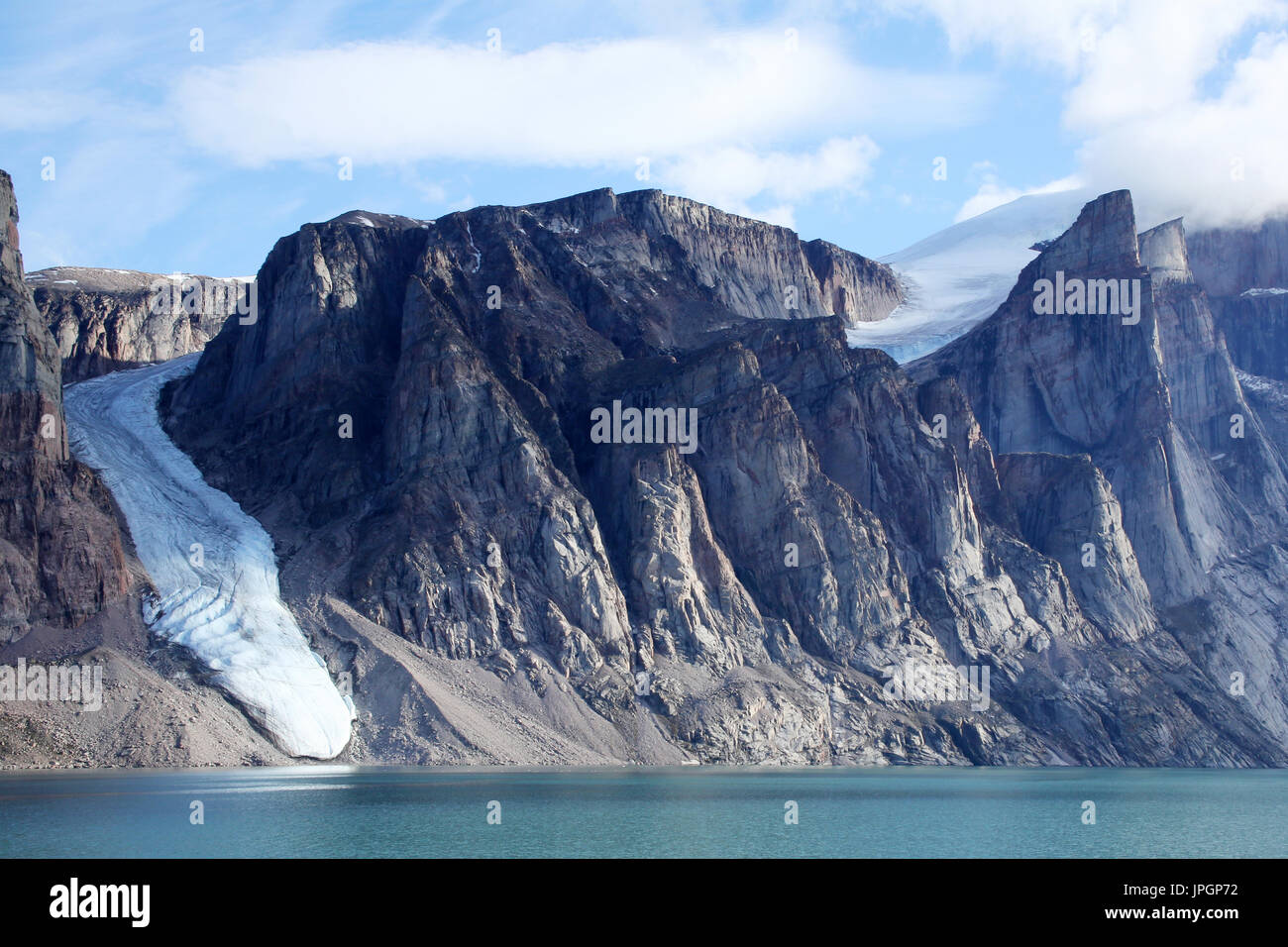Glacier sighted when the expedition ship cruised into one of the fjords of Baffin Bay, Arctic Circle Stock Photo