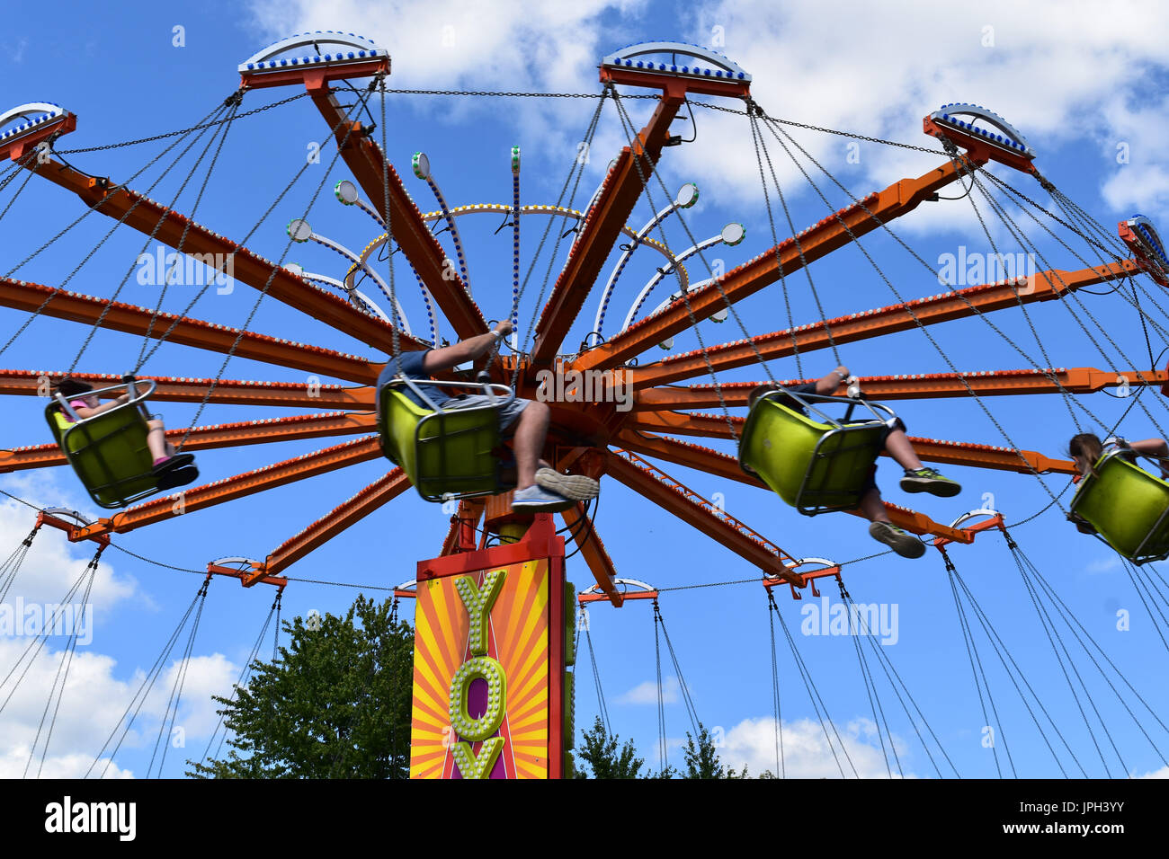 Swing ride at a carnival Stock Photo - Alamy