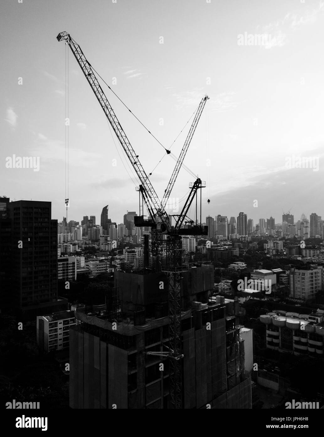 Construction site tower cranes aerial Black and White Stock Photos ...