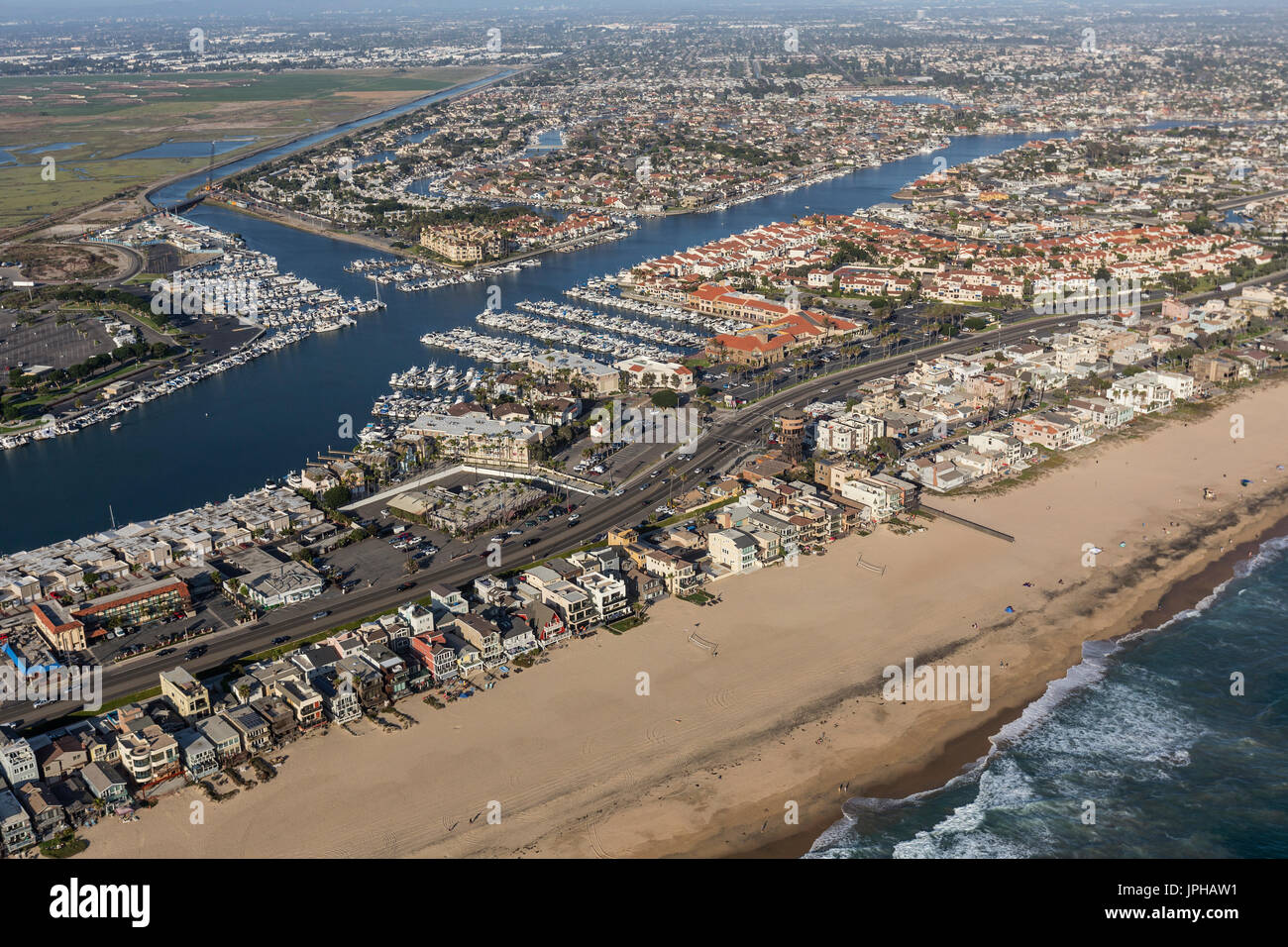 Aerial of Sunset Beach ocean front homes in Orange County California. Stock Photo
