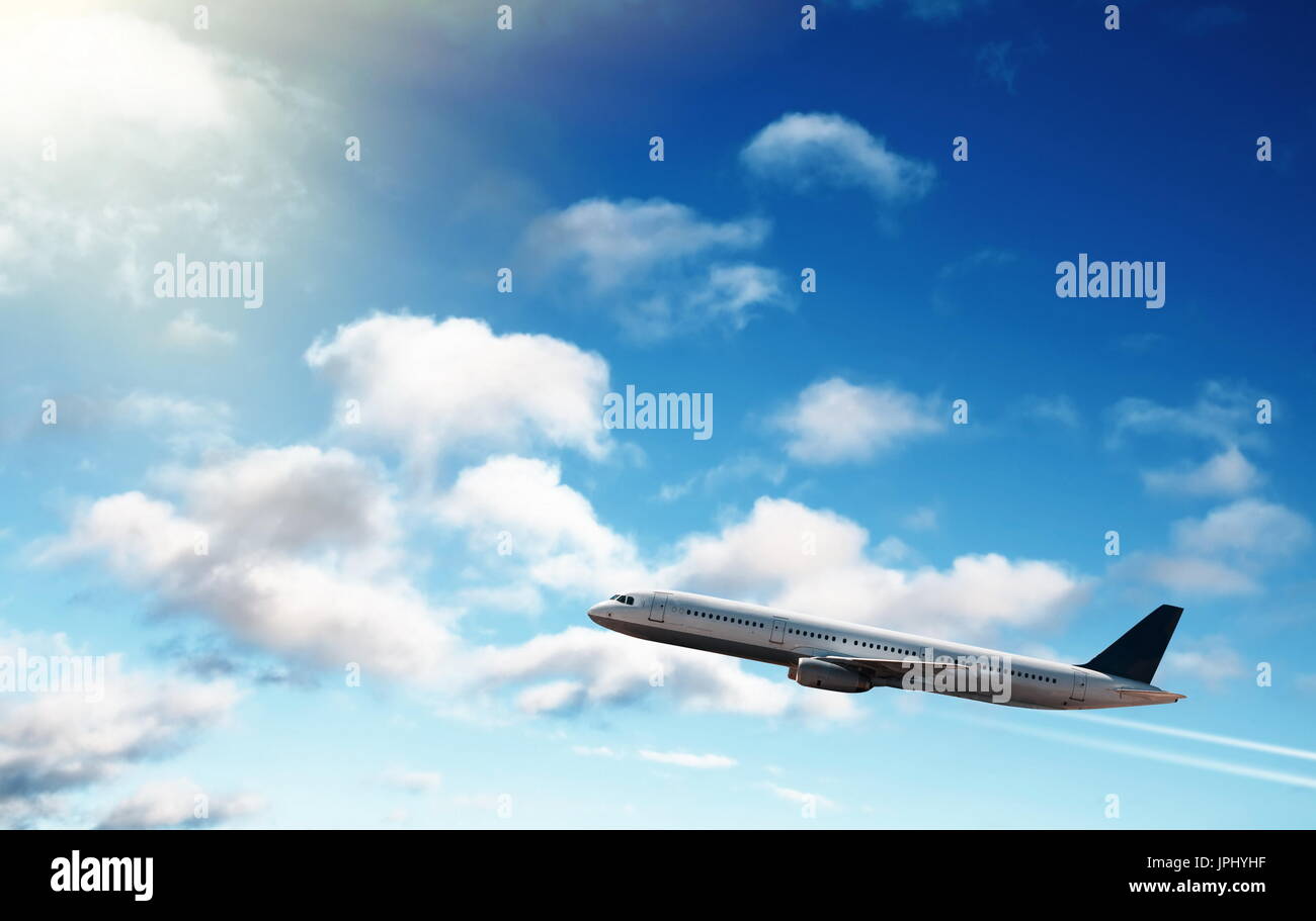 airplane in the blue sky Stock Photo - Alamy