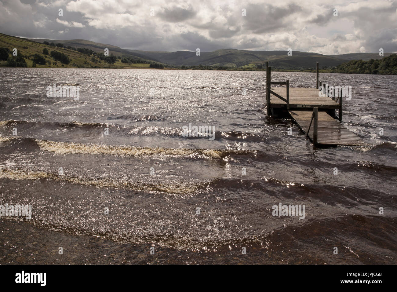 Flooded landing pier at Semer Water in North Yorkshire during windy weather Stock Photo