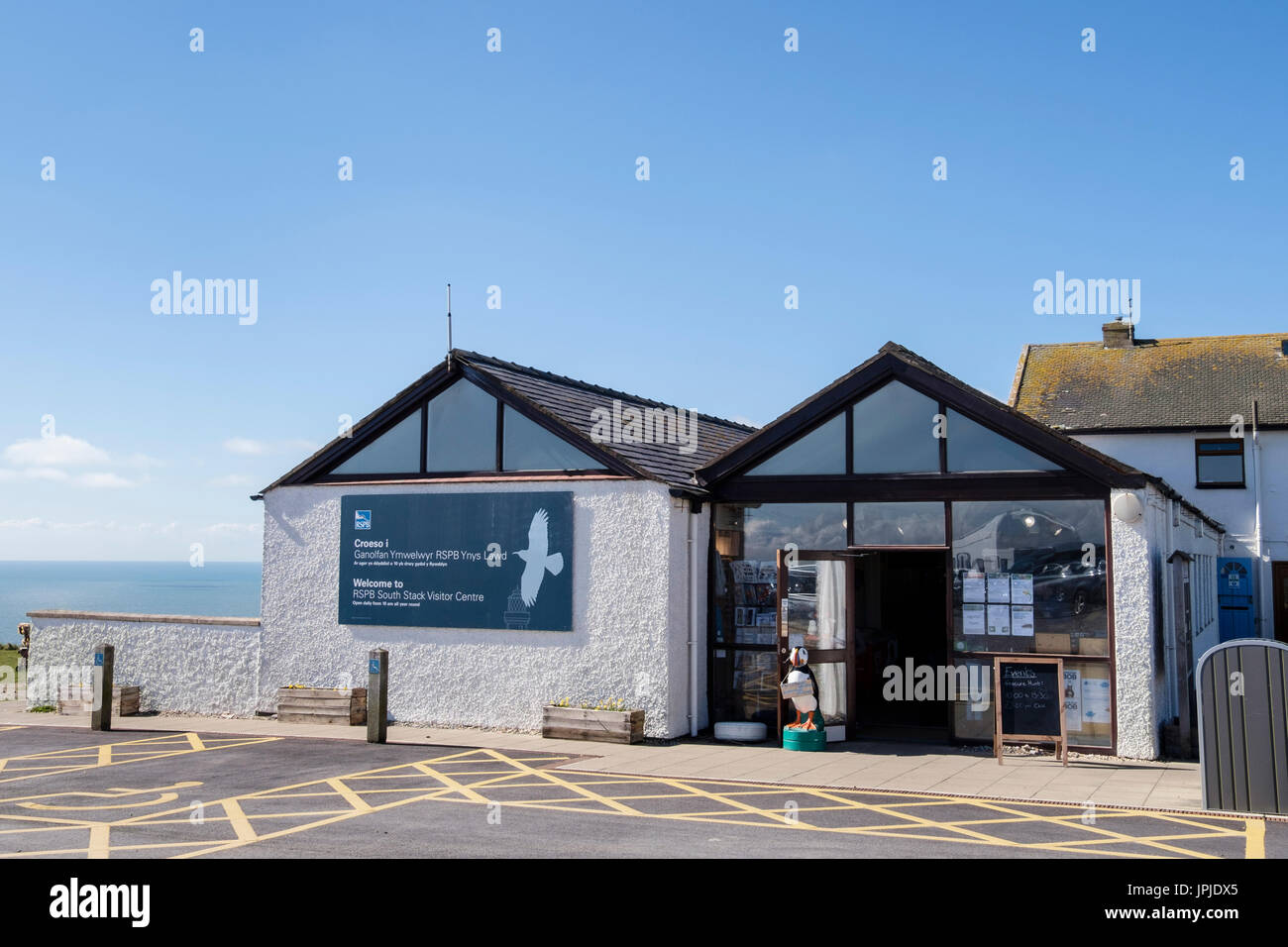RSPB South Stack Visitor Centre shop and cafe with disabled parking bays outside. Holyhead, Holy Island, Isle of Anglesey (Ynys Mon), Wales, UK Stock Photo