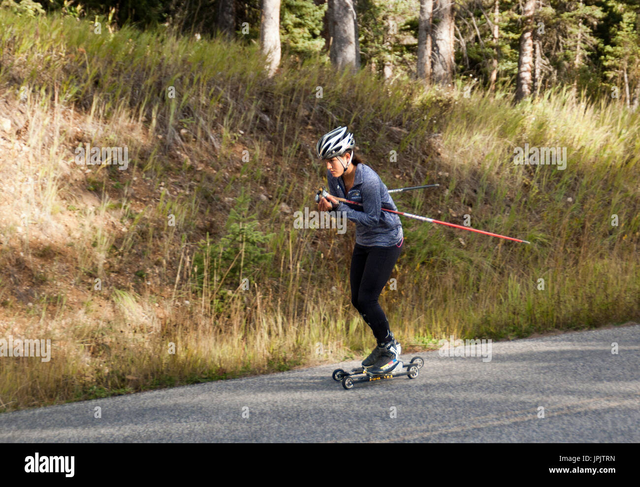training for snow skiing on the highway in Montana Stock Photo