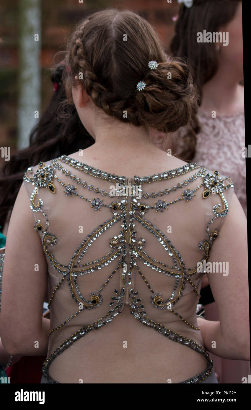 Teenage Girls Attending The High School Prom All Dressed Up In