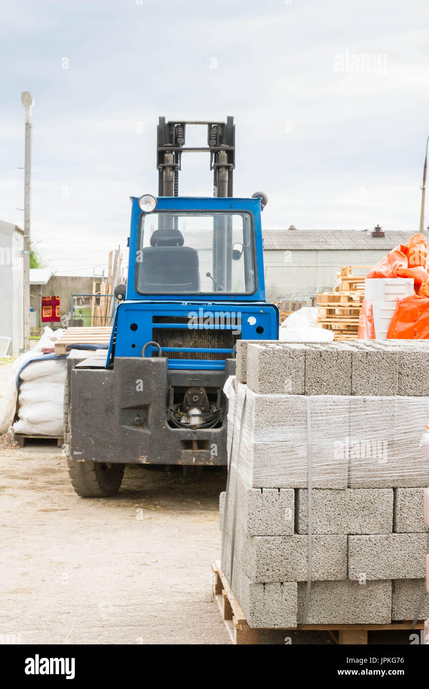Open base construction with building materials Stock Photo - Alamy