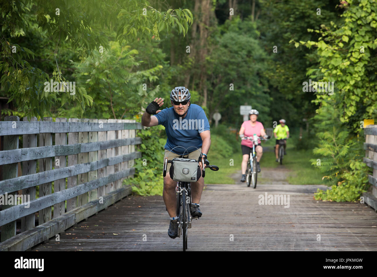 Bicyclists on the Erie Canalway Trail, near Canajoharie, New York State, during the annual Cycle the Erie Canal bike tour event. Stock Photo