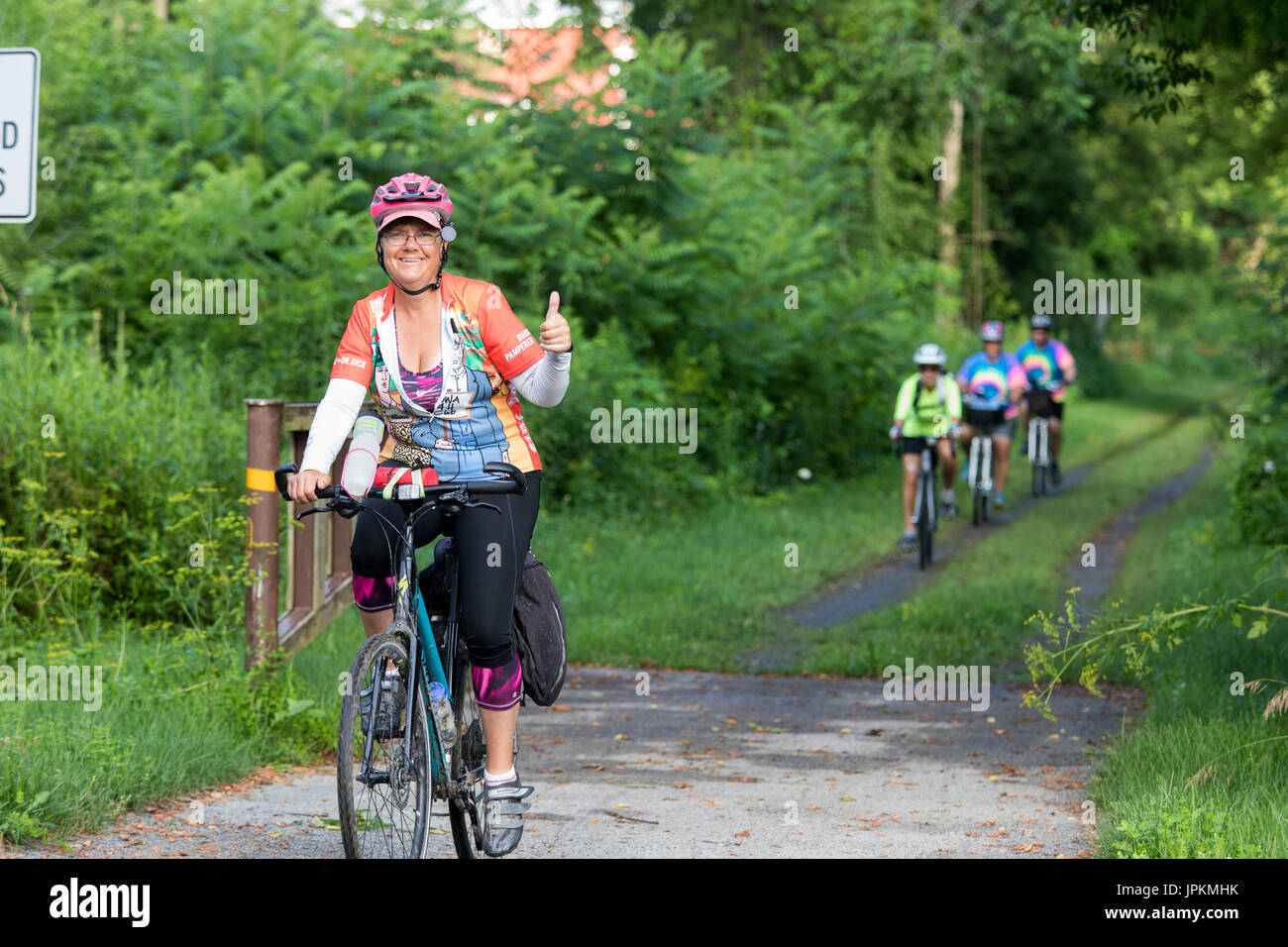 Bicyclists on the Erie Canalway Trail, near Canajoharie, New York State, during the annual Cycle the Erie Canal bike tour event. Stock Photo