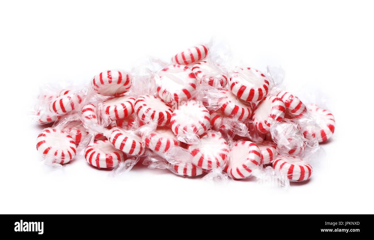 A pile of peppermint candies on a white background Stock Photo - Alamy
