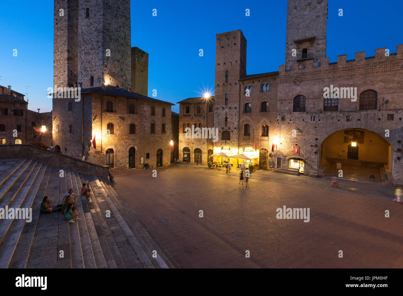 night view of amazing medieval towers in the Italian town of San ...