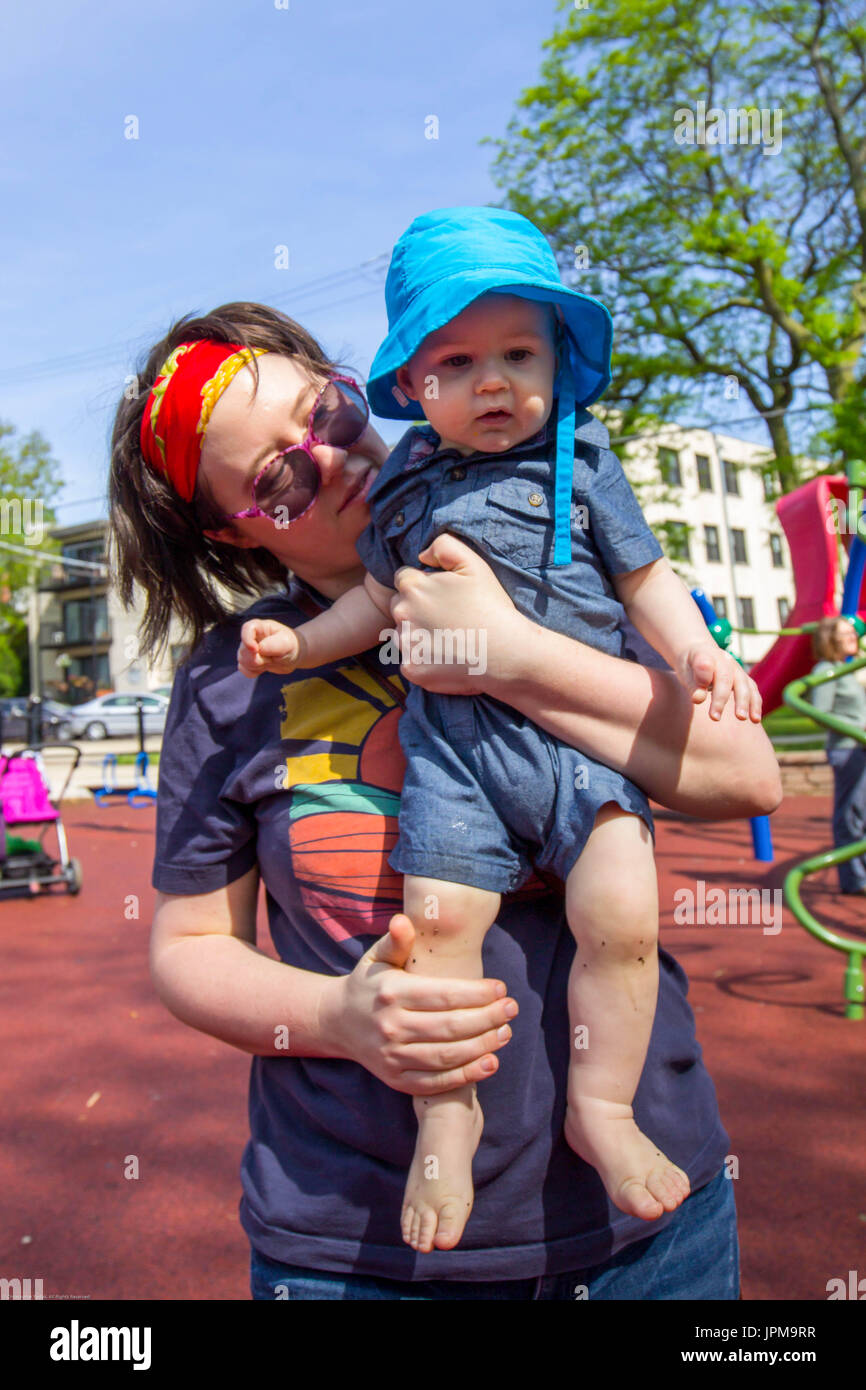 MOther and baby at the playground Stock Photo - Alamy