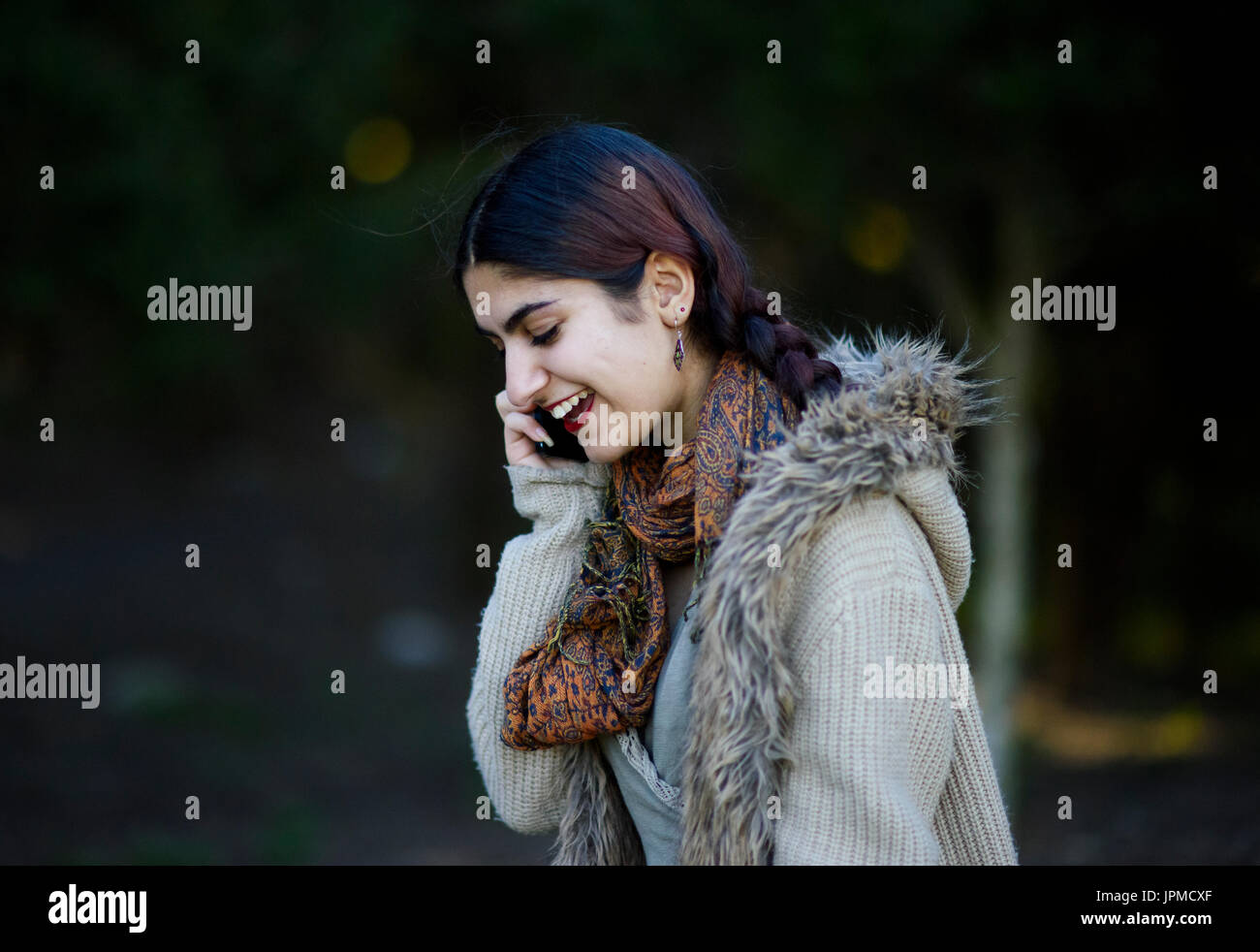 Young Persian woman in the park Stock Photo