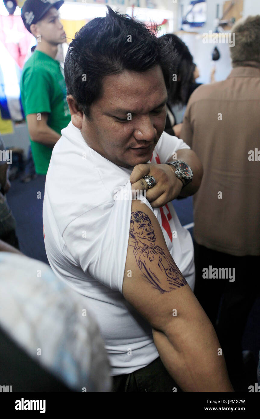 Buboy Fernandez Showing His Tattoo Of Manny Pacquiao At The Manny Pacquiao Vs Juan Manuel Marquez Iii Media Day Held At The Wildcard Gym In Hollywood Ca The Event Took Place On