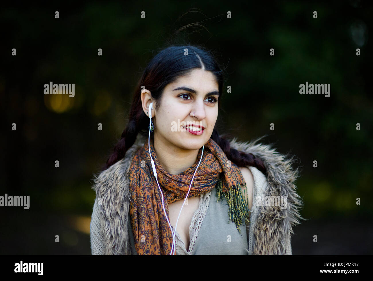 Young Persian woman in the park Stock Photo