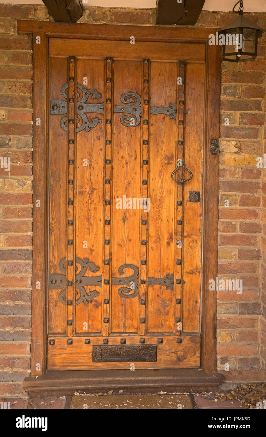 Unusual Golden Brown Wooden Door Of Historic Cottage With Highly