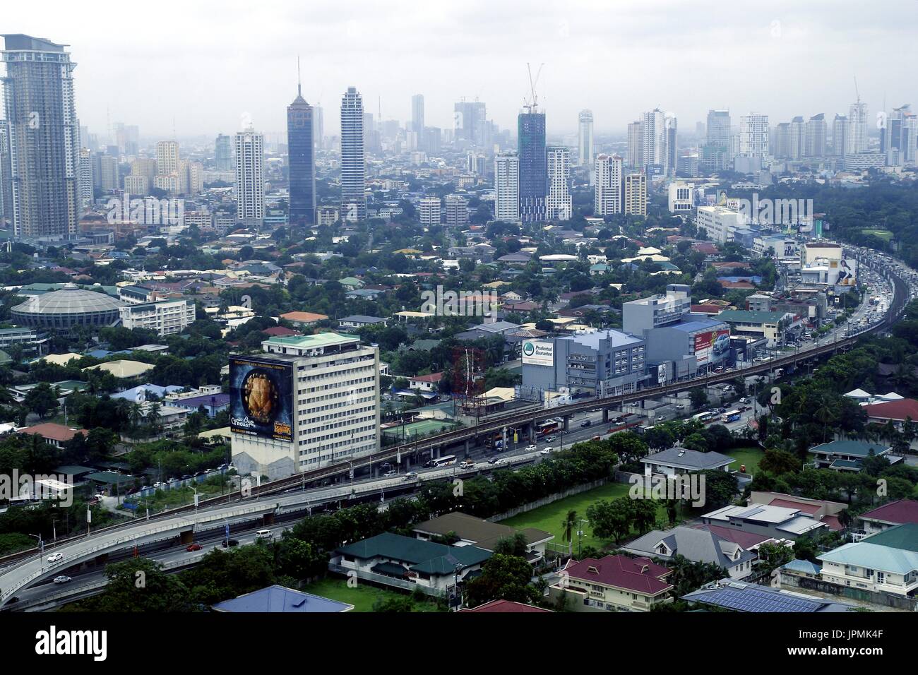 METRO MANILA, PHILIPPINES - JULY 31, 2017: Aerial view of residential and commercial areas and establishments in Metro Manila. Stock Photo