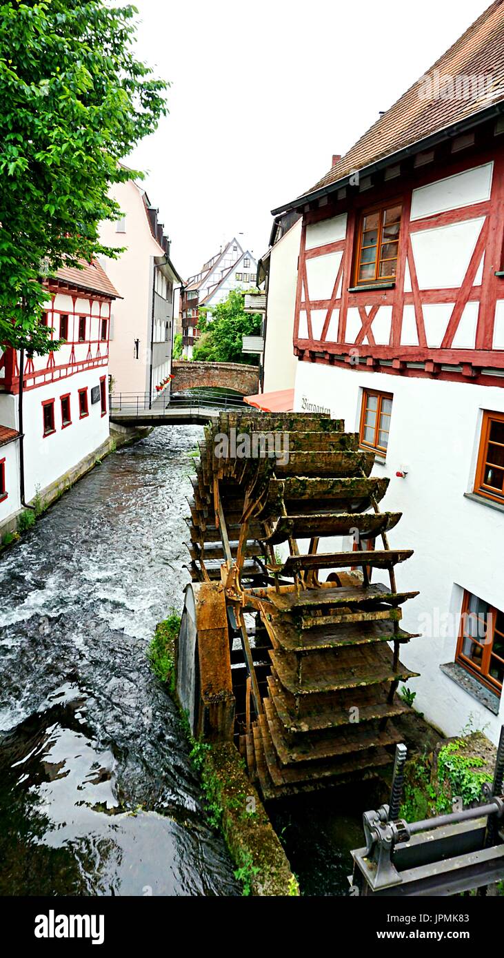 Buildings and old mill wheel along river Große Blau in fishermen's quarter  in Ulm, Baden-Wuerttemberg, Germany Stock Photo