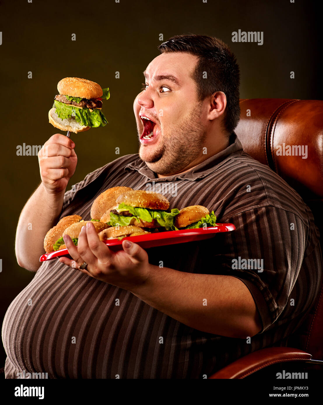 Fat Guy Eating Hi Res Stock Photography And Images Alamy