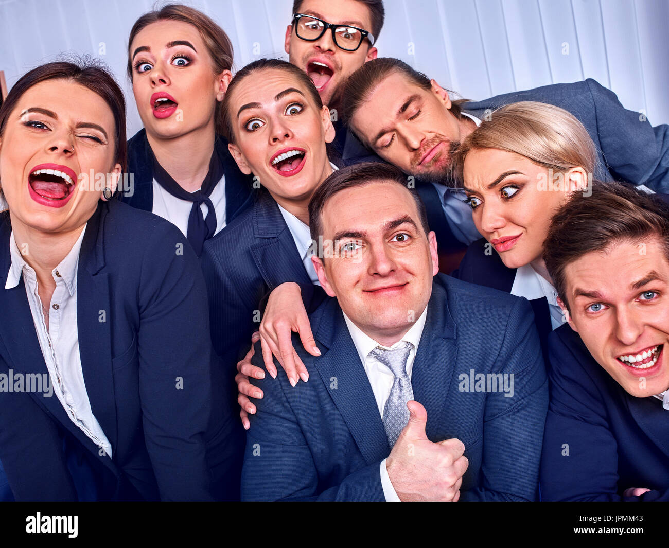 Business people office life of team people are happy with thumb up. Stock Photo