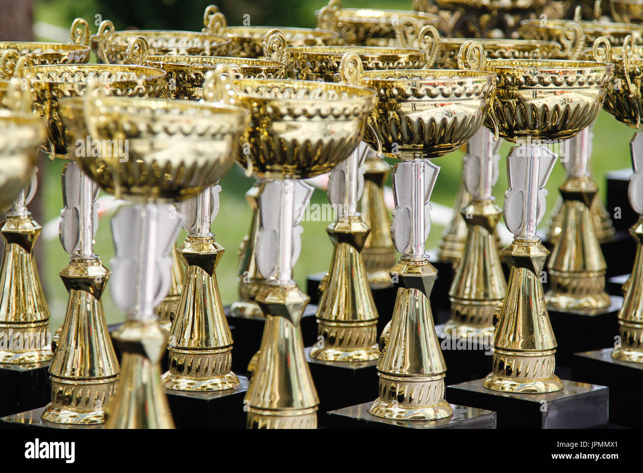 a lot of golden cups for champion Stock Photo