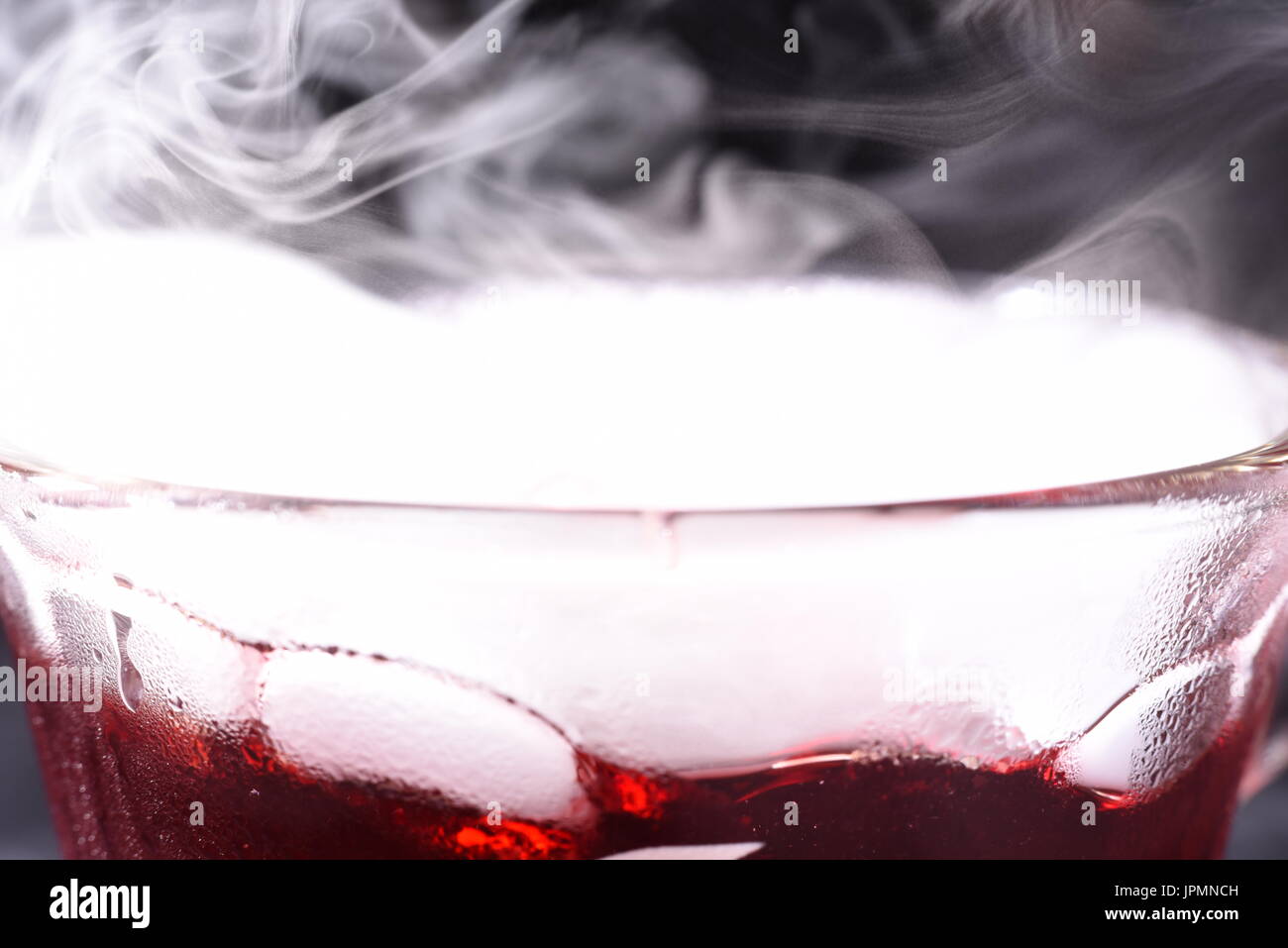 Carbonating a drink with dry ice Stock Photo