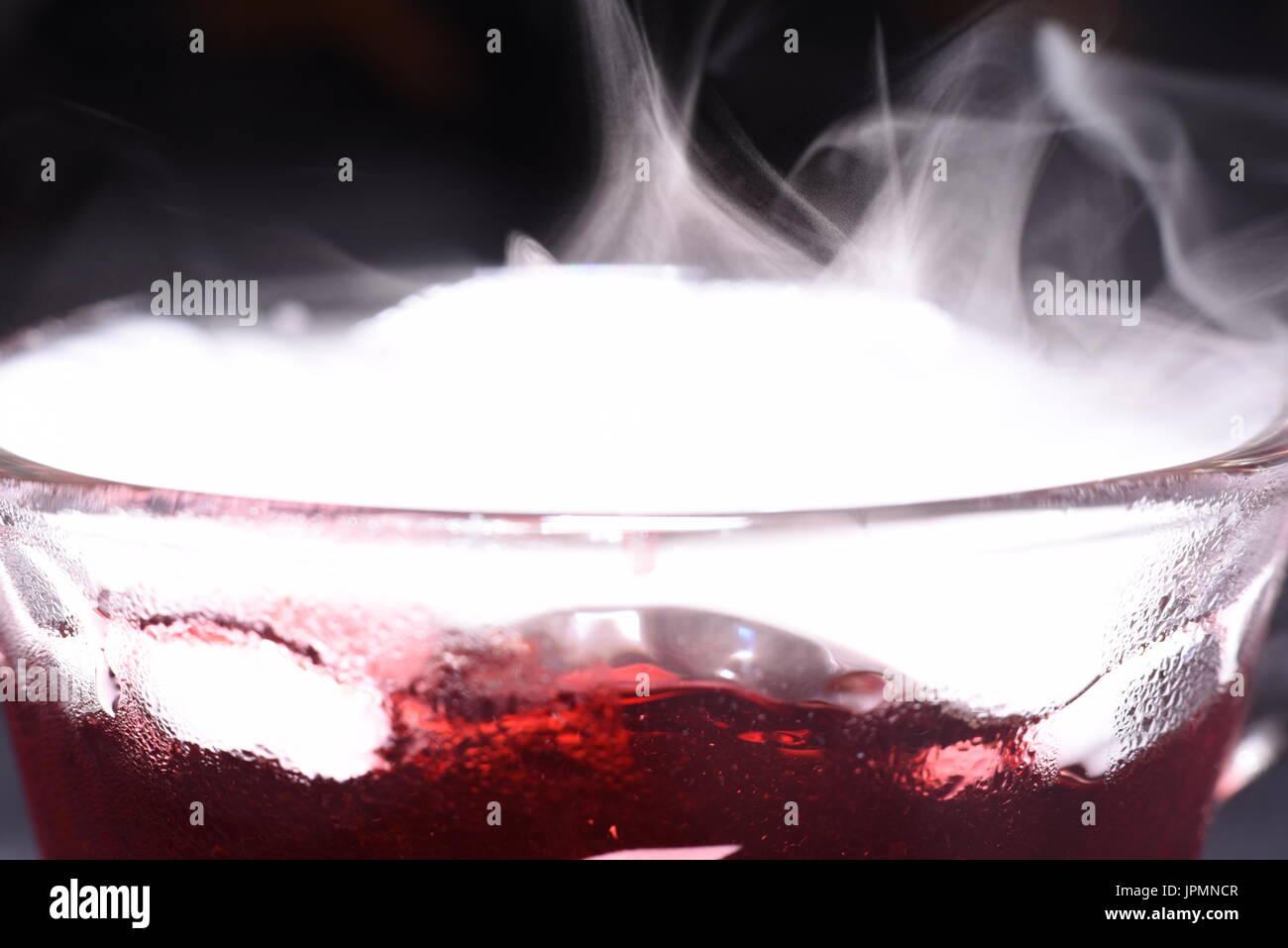Carbonating a drink with dry ice Stock Photo