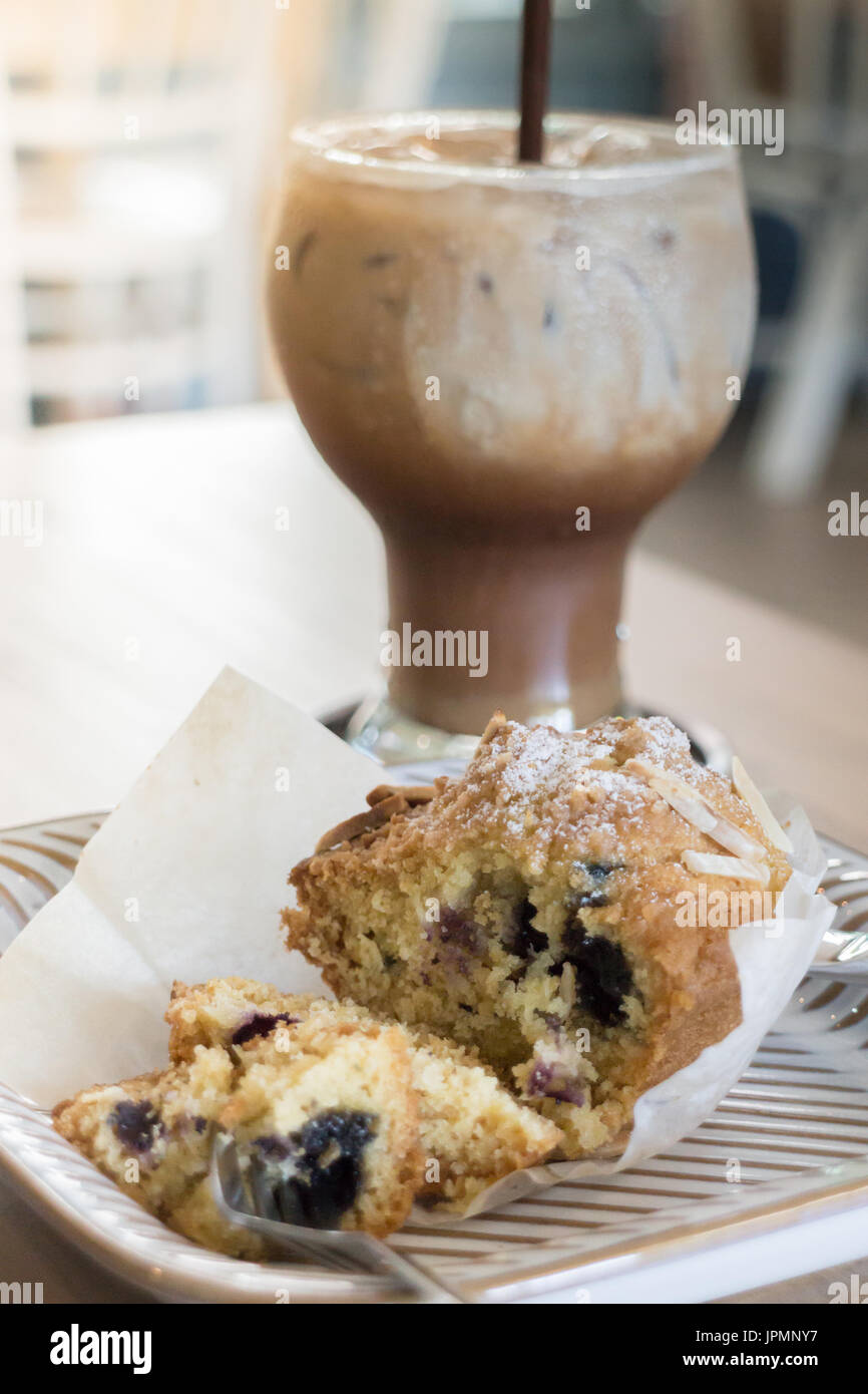 Blueberry muffin and iced coffee mocha, stock photo Stock Photo Alamy