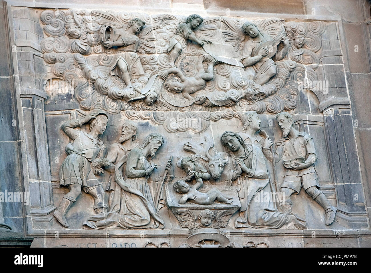 Relief of the adoration of the shepherds, relief of the Front of the chapel of El Salvador of Ubeda, Jaen province, Spain Stock Photo
