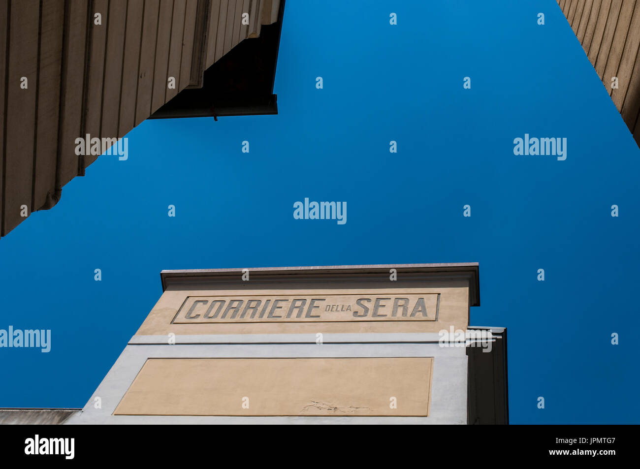 Italy: historic sign of Corriere della Sera, the most important Italian daily newspaper, founded in Milan in 1876, from the courtyard of the palace Stock Photo