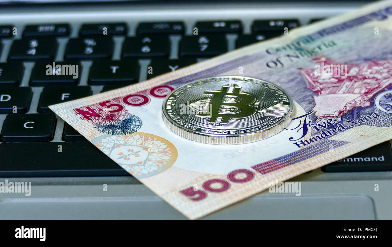 Bitcoin on Nigerian Naira banknote. Electronic money exchange concept Stock  Photo - Alamy