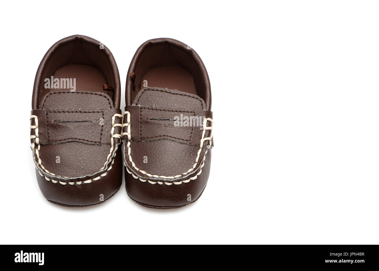 Baby shoes isolated on a white background Stock Photo - Alamy