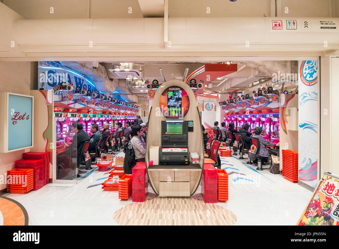 TOKYO, JAPAN - 8 JANUARY 2017 - Pachinko Parlor in Akihabara. It's a type of mechanical arcade game originating in Japan widely used as a recreational Stock Photo