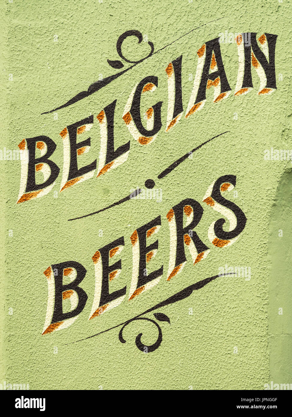 Belgian Beers - Painted Sign advertising Belgian beers on the wall of a pub in Cambridge UK Stock Photo