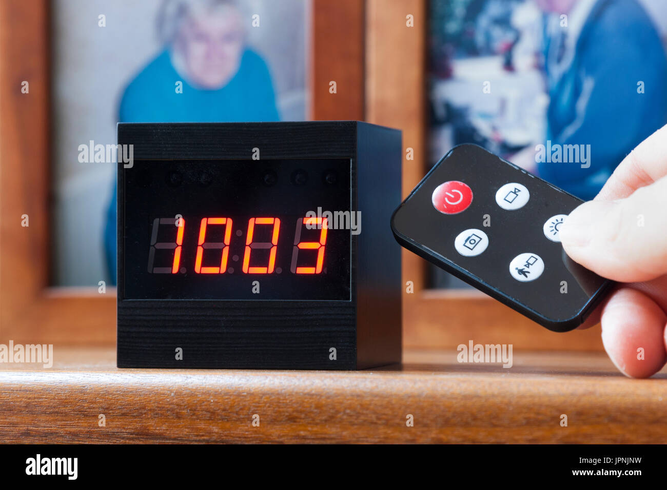 Secret spy camera hidden in a digital clock of the sort used to monitor