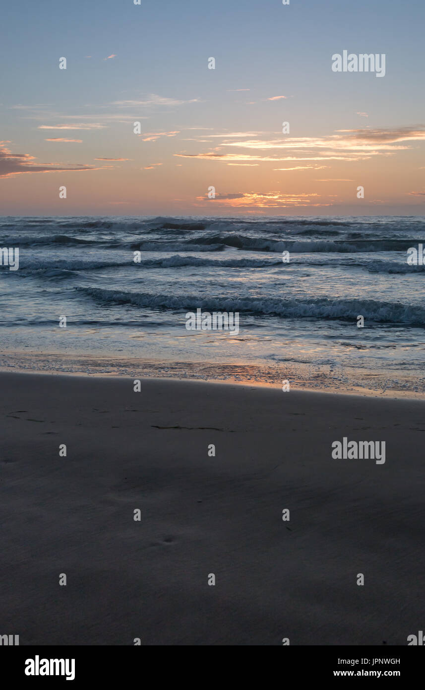 Portrait View of Sunset On South Padre Island Beach Stock Photo