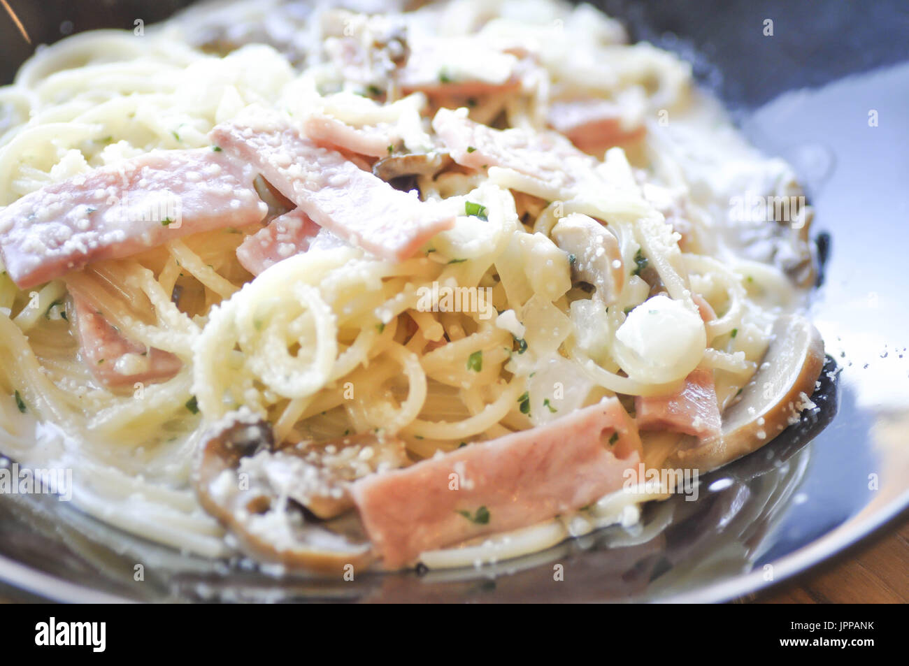 spaghetti carbonara with mushroom and ham Stock Photo Alamy