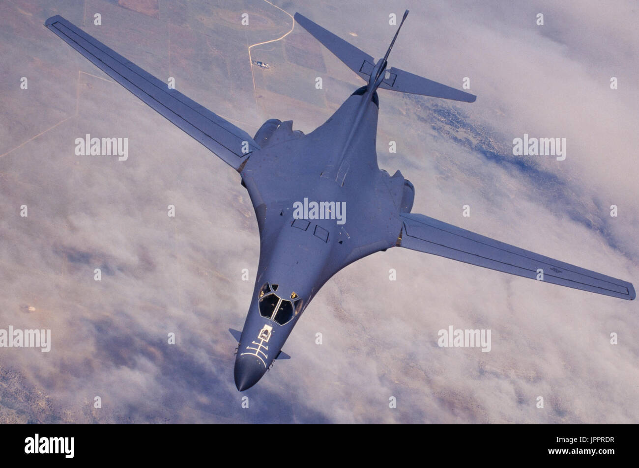 A supersonic U.S. Air Force Lancer B-1 bomber in flight. Stock Photo