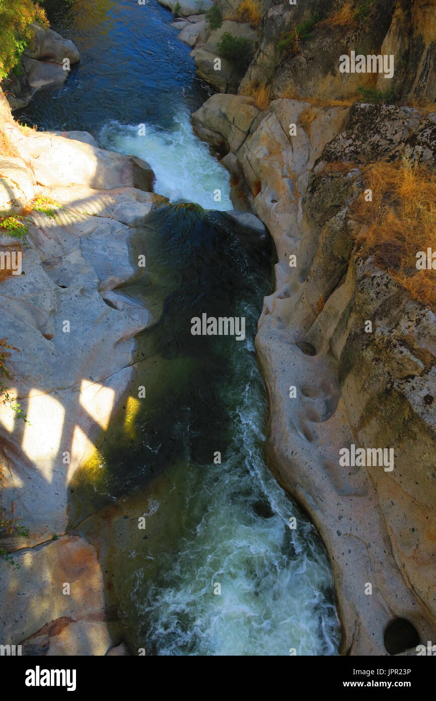 Kaweah River gorge with shadow from bridge on Mineral King Road, Sequoia National Park, California Stock Photo