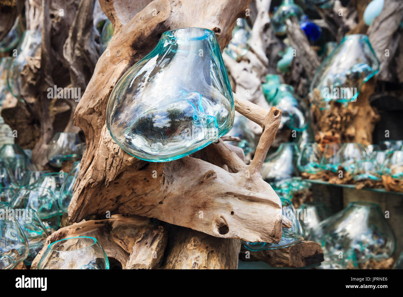 Glass Blowing. Unusual handmade shape glassware vases on sale. Ubud