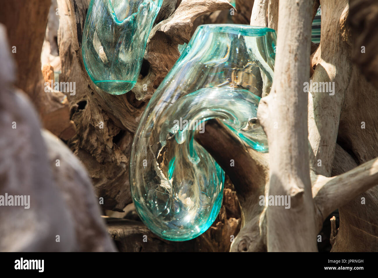 Glass Blowing. Unusual handmade shape glassware vases on sale. Ubud